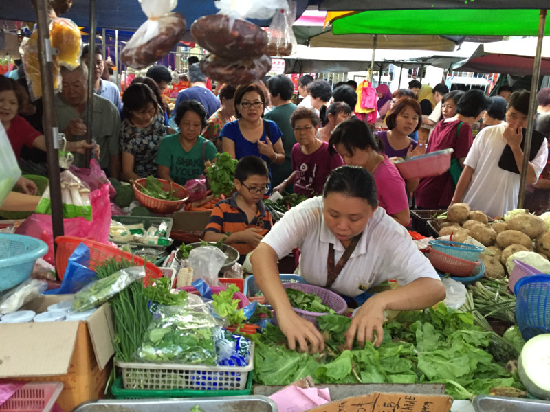 People buy fresh produce at a market in Penang to prepare for the reunion dinner on the eve of Chinese New Year on February 7, 2016. u00e2u20acu201d Picture by KE Ooi