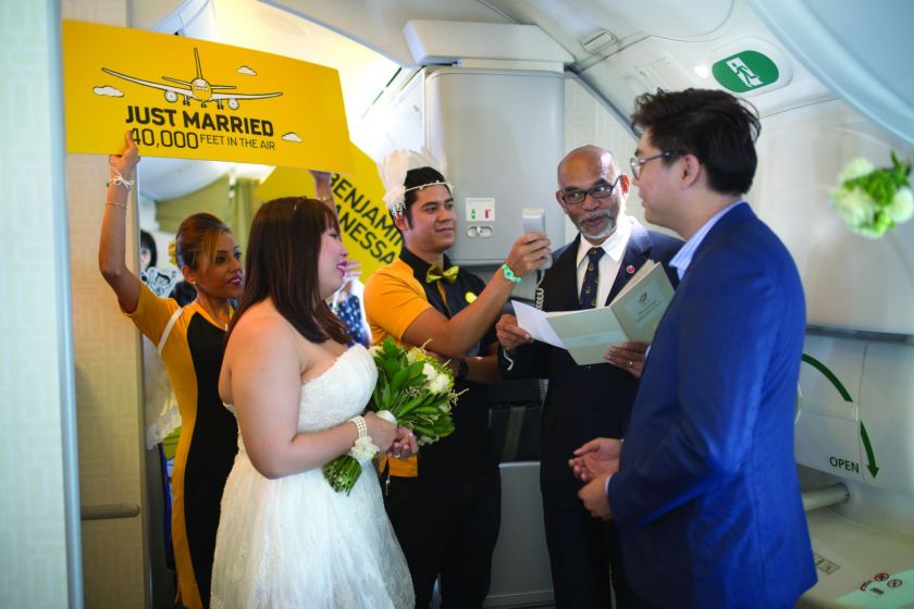 Benjamin Lee and Janessa Li Ling had their wedding ceremony onboard a Scoot 787 Dreamliner. u00e2u20acu201d TODAY pic