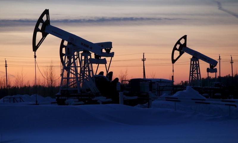 Pump jacks are seen at the Lukoil company owned Imilorskoye oil field, as the sun sets, outside the West Siberian city of Kogalym, Russia, January 25, 2016. u00e2u20acu201d Reuters pic