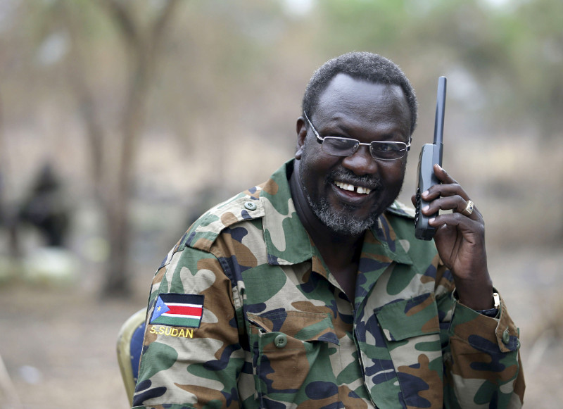 South Sudan's rebel leader Riek Machar talks on the phone in his field office in a rebel controlled territory in Jonglei State in this February 1, 2014 file photo. u00e2u20acu201d Reuters pic