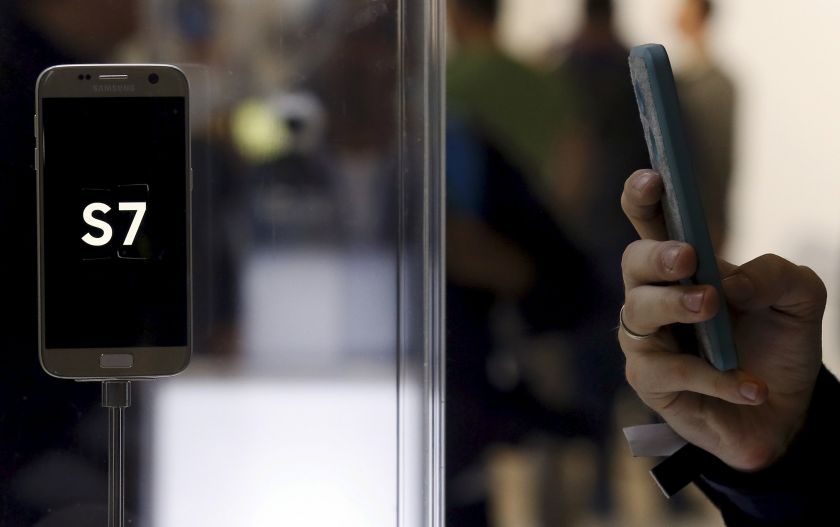 A man takes a picture of the new Samsung S7 smartphone after its unveiling ceremony at the Mobile World Congress in Barcelona, Spain February 22, 2016.u00e2u20acu201d Reuters pic