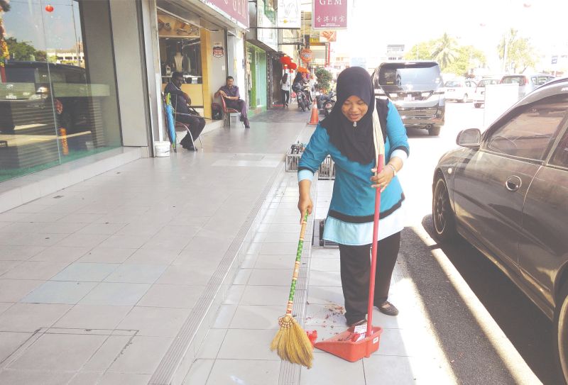 Ana says she does not see her cleaning job as something that is lowly, as it provides enough for her daily needs. u00e2u20acu2022 Malay Mail pic