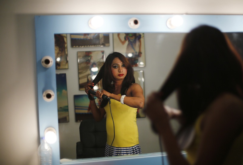 An aspiring model does her hair before auditioning for a transgender/transsexual modelling agency set to open in New Delhi, India, February 7, 2016. u00e2u20acu201d Reuters pic