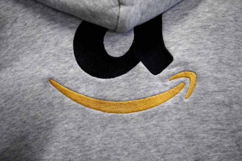 An Amazon logo is seen on a workeru00e2u20acu2122s jacket at an Amazon Fulfilment Centre in Wroclaw, Poland, in this file photograph dated December 3, 2015. u00e2u20acu201d Reuters pic