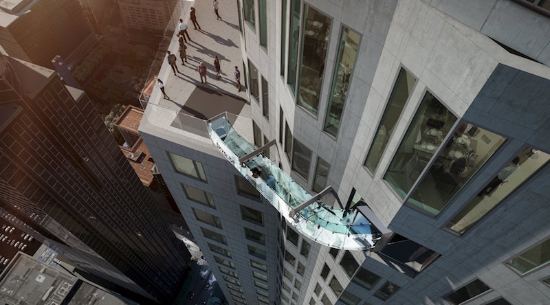 An artist rendering of the u00e2u20acu02dcSkyslideu00e2u20acu2122 attraction, an outdoor glass slide positioned close to 1,000 feet above downtown Los Angeles, California, is shown in this image released by OUE Skyspace on March 2, 2016. u00e2u20acu201d Handout via Reuters