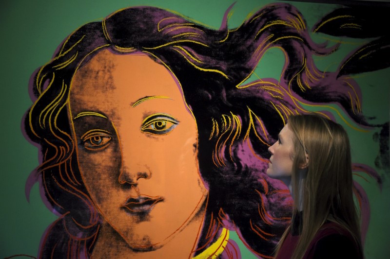 A museum employee views u00e2u20acu02dcDetails of Renaissance Paintings (Sandro Botticelli, Birth of Venus, 1482)u00e2u20acu2122 by Andy Warhol at the Victoria and Albert museum in London March 2, 2016. u00e2u20acu201d Reuters pic