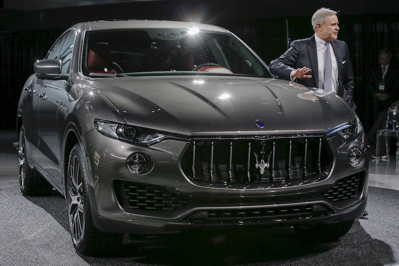 Maserati CEO Harald Wester stands beside the Maserati Levante SUV during the 2016 New York International Auto Show media preview in New York March 23, 2016. — Reuters pic