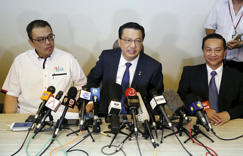 Transport minister Datuk Seri Liow Tiong Lai (centre) speaks at a news conference about debris found on a beach in Mozambique that may be from missing Malaysia Airlines flight MH370, in Kuala Lumpur on March 3, 2016. u00e2u20acu201d Reuters pic