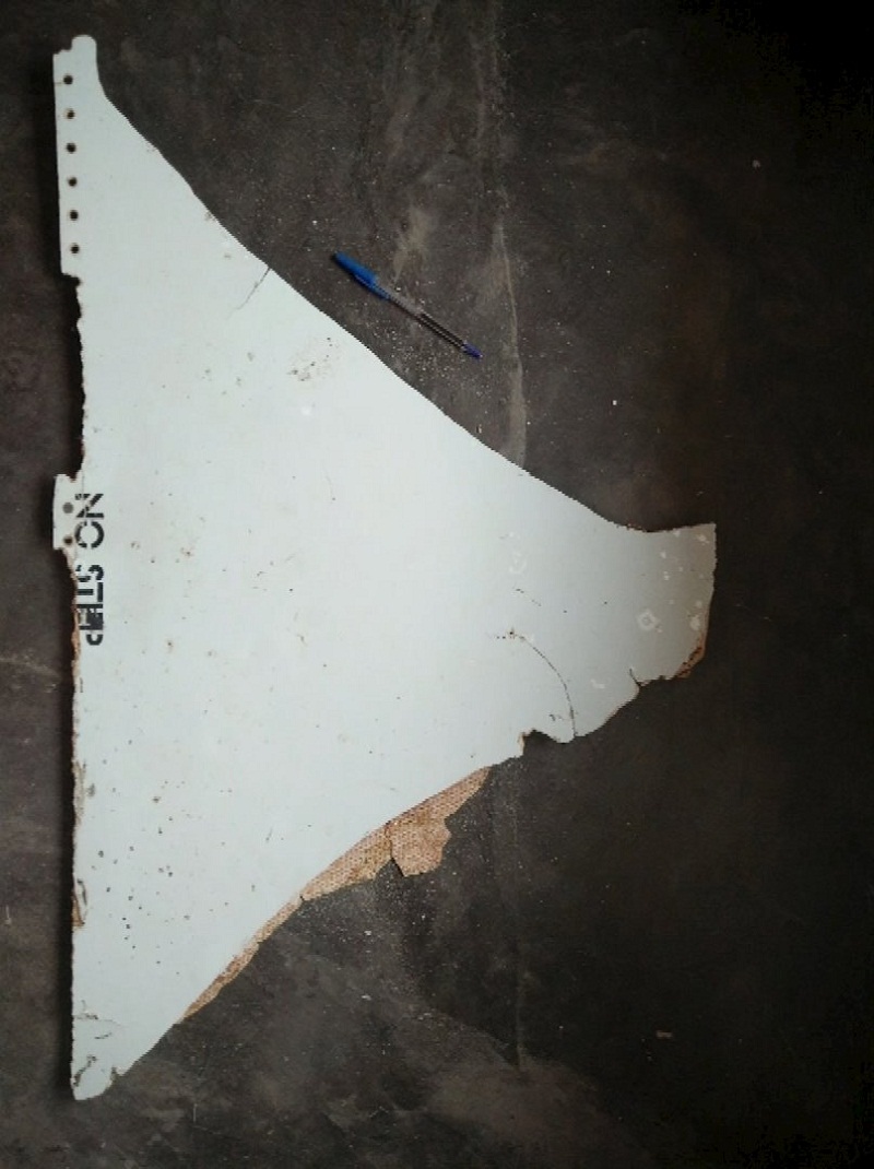 A photograph of debris thought to be from the missing Malaysian Airlines MH370 plane is seen in this still image taken from video shot March 3, 2016.