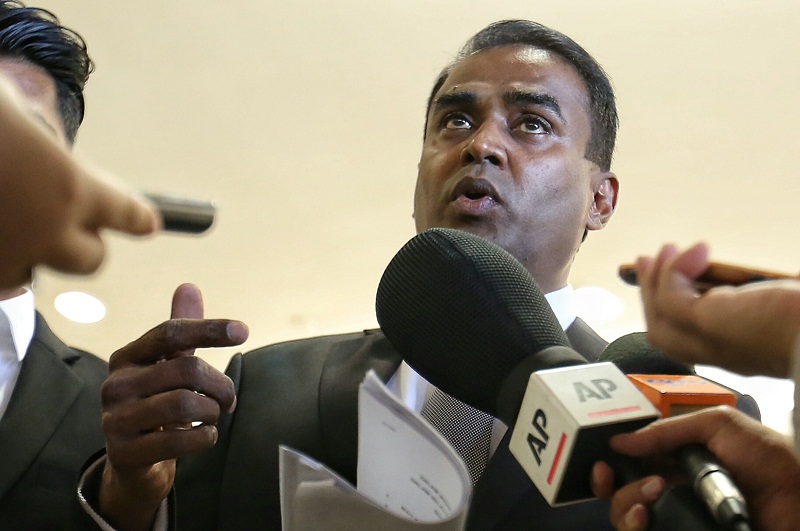 Lawyer Datuk Dr Arunan Selvaraj speaks to reporters at the High Court in Kuala Lumpur on March 3, 2016. u00e2u20acu201d Picture by Saw Siow Feng