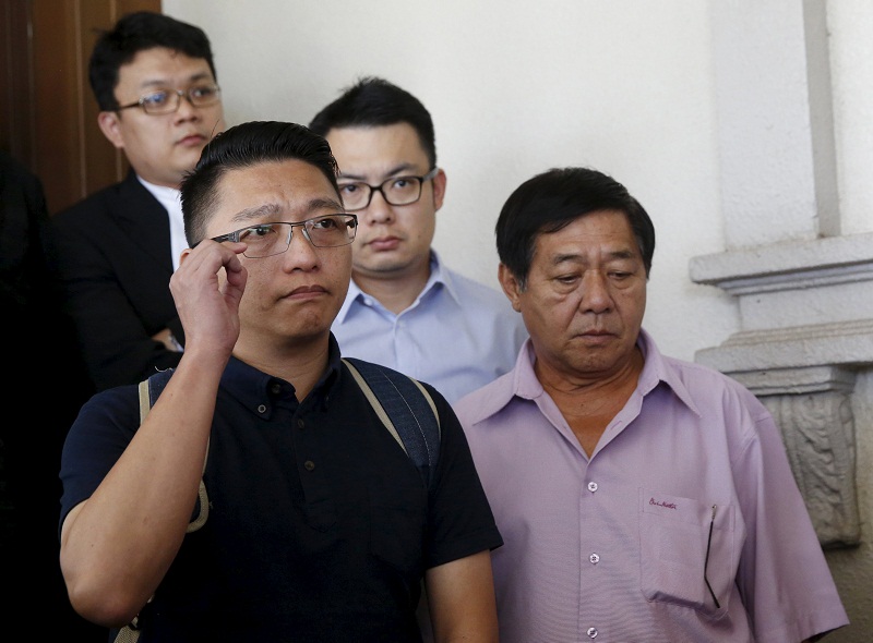Relatives of passengers who were aboard missing Flight MH370, leave court during a hearing for a compensation suit brought against the Malaysian government and Malaysia Airlines over claims of negligence and breach of trust, in Kuala Lumpur on March 4, 2016.