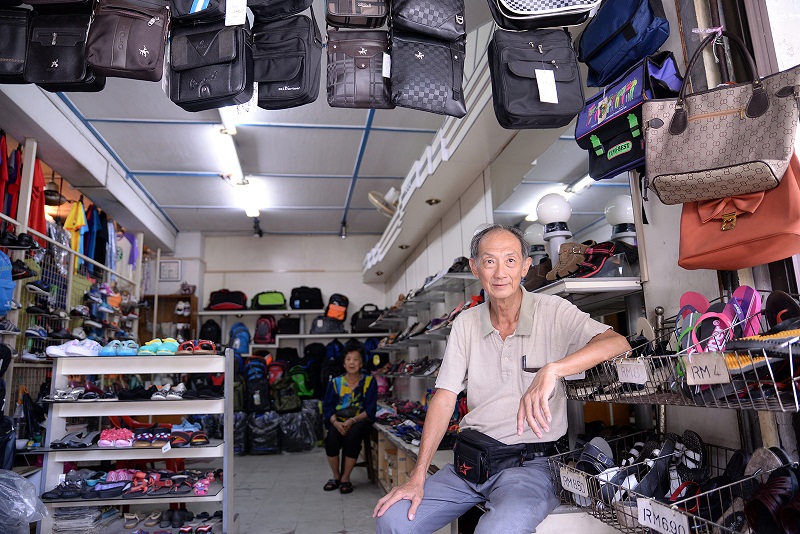 Teong and his mother at their shop along Penang Road which they are now renting for RM2,000, increased from RM650. u00e2u20acu201d Picture by K.E.Ooi