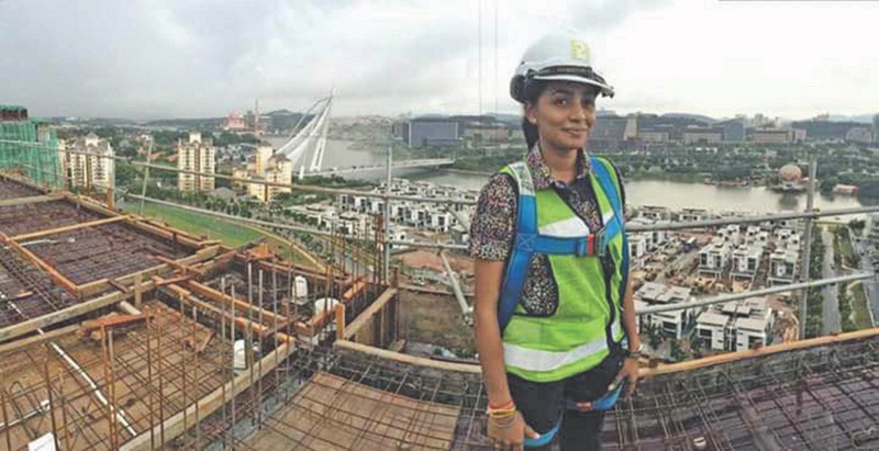 Site engineer Monisha Chatri, 28, says she has been in the mechanical engineering field for the past six years. u00e2u20acu201d Picture by Malay Mail