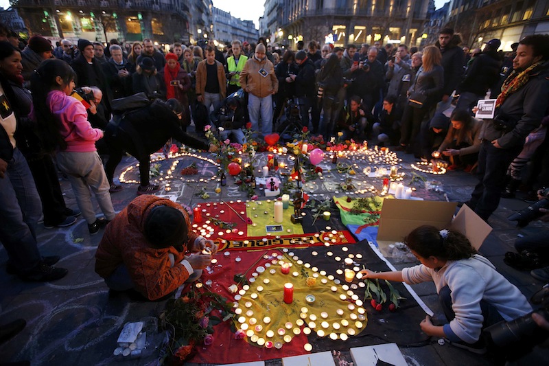 People gather around a memorial in Brussels following bomb attacks in Brussels, Belgium, March 22, 2016. u00e2u20acu201du00c2u00a0Reuters pic