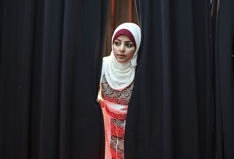 Rawan Okasha before the start of her concert at a theatre in Gaza City, March 10, 2016.