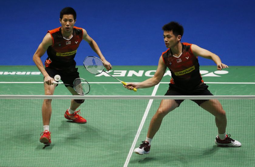 Malaysia's Goh V Shem (left) and Tan Wee Kiong in action during the semi finals of the men's doubles at the All England Championships in Birmingham last night. u00e2u20acu2022 Reuters pic