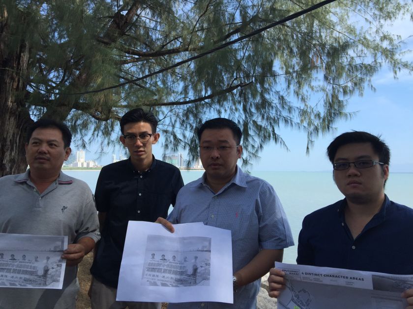 Hng Chee Wey (third from left) wants the state government to reveal plans for the remaining 71 acres of reclaimed land off Gurney Drive. u00e2u20acu201d Picture by Opalyn Mok