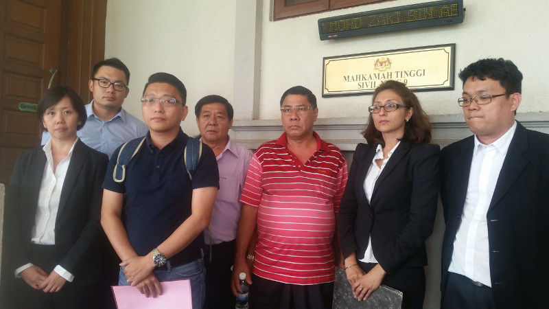 Lawyer Sangeet Deo (2nd right) speaks to members of the media, accompanied by relatives of passengers Tan Ah Meng, his wife Chuang Hsiu Ling, and son Tan Wei Chew, who were aboard the missing MAS flight MH370 on March 4, 2016. u00e2u20acu201d Picture by Ida Lim