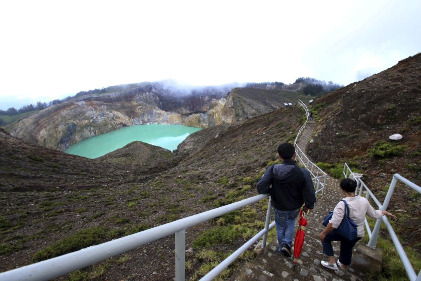 Visitors make their way towards a lake on Kelimutu volcano, a popular tourist site, near Ende, on Flores island, Indonesia April 1, 2016. u00e2u20acu201d Reuters pic
