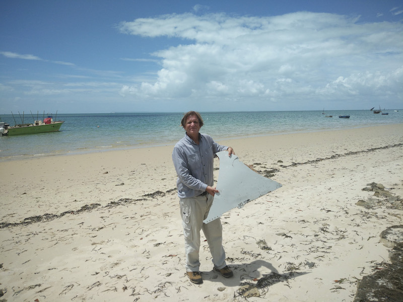 In an undated handout photo, Blaine Alan Gibson with the debris he discovered on the coast of Mozambique. u00e2u20acu201d Picture by Blaine Alan Gibson via The New York Times