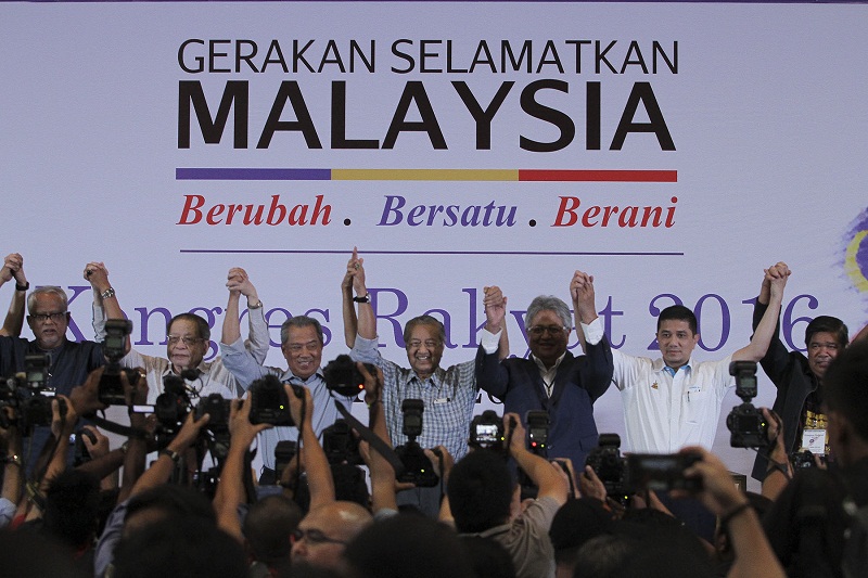 Leaders of the 'Save Malaysia' movement pose for photographs during the Kongress Rakyat 2016 forum in Shah Alam, March 27, 2016. u00e2u20acu201d Picture by Yusof Mat Isa