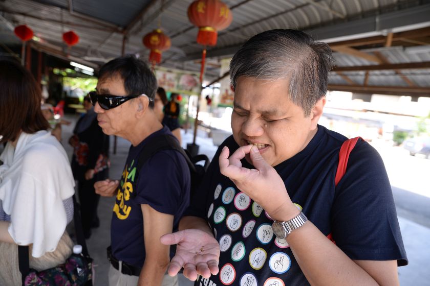 Wong Yoon Long tasting the nutmeg at the Ghee Hup Nutmeg Factory. ― Picture by K.E.Ooi