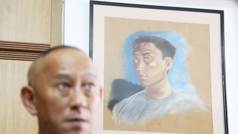 Benedict Lee Kuan Yew, 57, with a self-portrait of his younger self. — TODAY pic