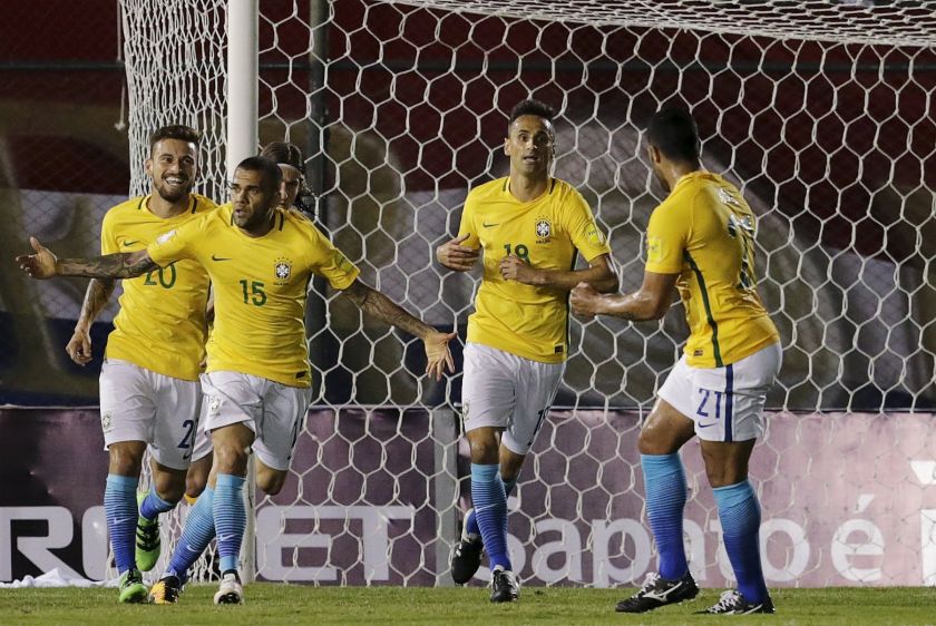 Daniel Alves (15) of Brazil celebrates his goal against Paraguay. u00e2u20acu201d Reuters pic