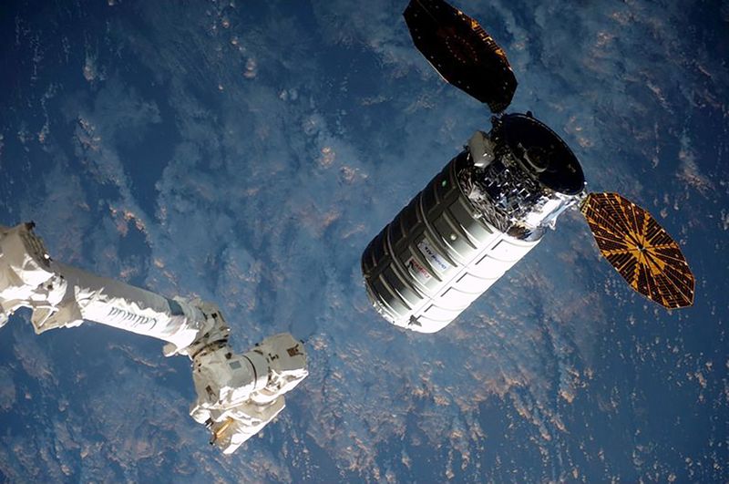 The Cygnus cargo ship nears the robotic arm at the International Space Station in this Nasa image taken March 26, 2016. u00e2u20acu201d Reuters pic 