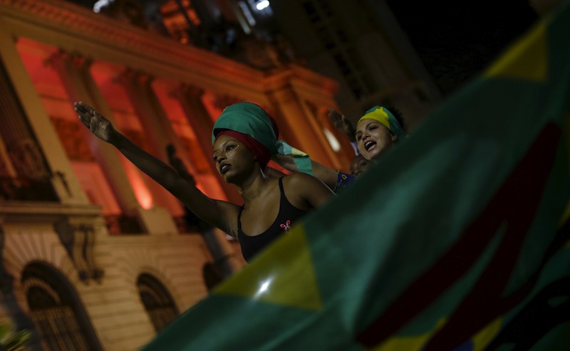 Women perform during a theatrical play at the 'Fest for Democracy' culture and political event in Rio de Janeiro, Brazil, March 24, 2016. u00e2u20acu201du00c2u00a0Reuters pic
