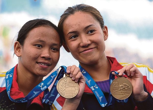 Divers Pandelela Rinong (left) and Leong Mun Yee garner 311.70 points at World Series 10m synchro, Beijing, March 11, 2016, to finish third. u00e2u20acu201d File picture Malay Mail supplied
