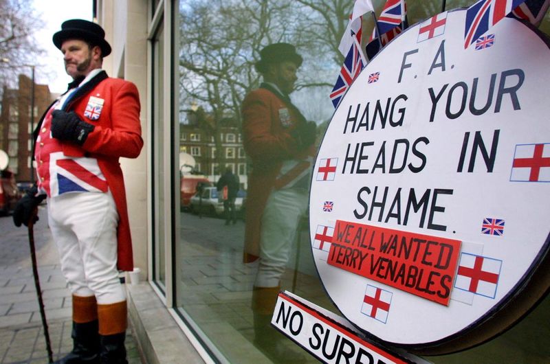 A protestor, dressed as a John Bull mascot, outside the English Football Association headquarters in London January 12, 2001. u00e2u20acu201d AFP pic 