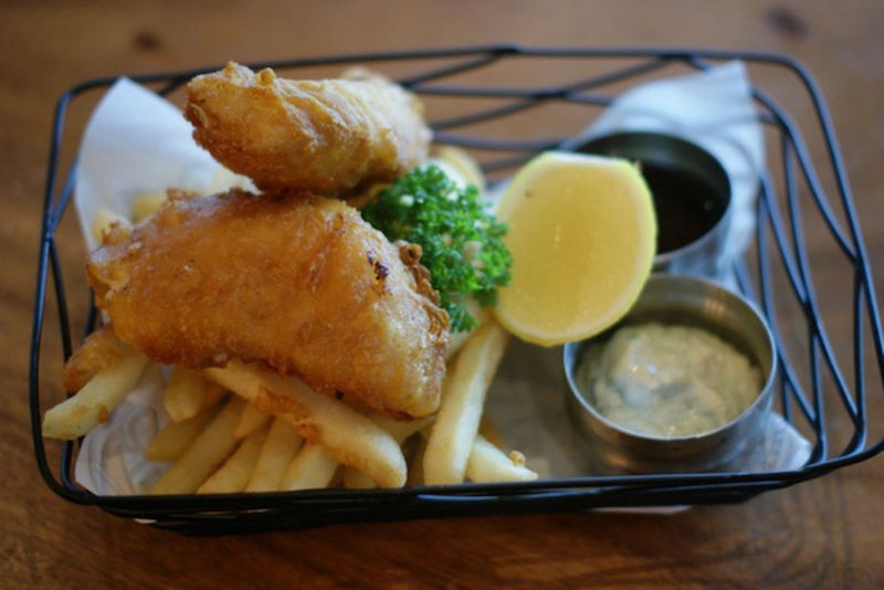 At The Chop House, premium cod is coated in a crisp beer batter, and served with mushy peas, French fries and homemade tartar sauce or a classic malt vinegar. u00e2u20acu201d TODAY pic