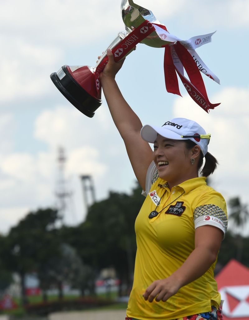 Jang holding aloft the trophy, Beyonce music to her ears.