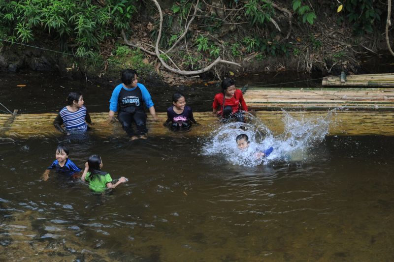 Children take a dip in a river in Gerik to cool down on a hot day. Picture released March 22, 2016. u00e2u20acu2022 Bernamapic