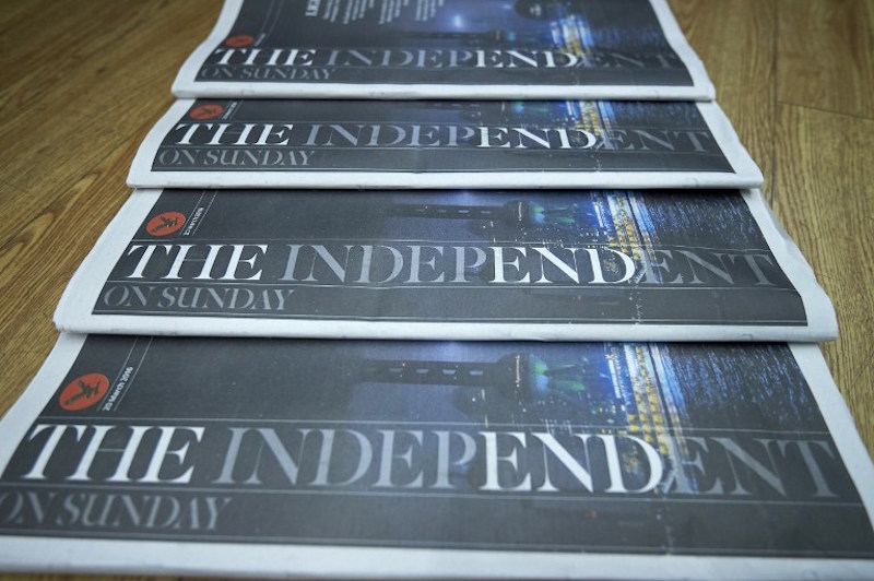 Copies of the last print edition of The Independent on Sunday are displayed for a photograph in London March 20, 2016. u00e2u20acu201d AFP picn