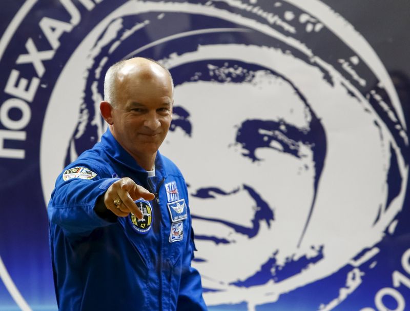 US astronaut Jeff Williams in front of a portrait of Yuri Gagarin, the first man in space, during a news conference at the Baikonur cosmodrome, Kazakhstan, March 17, 2016. u00e2u20acu201d Reuters pic