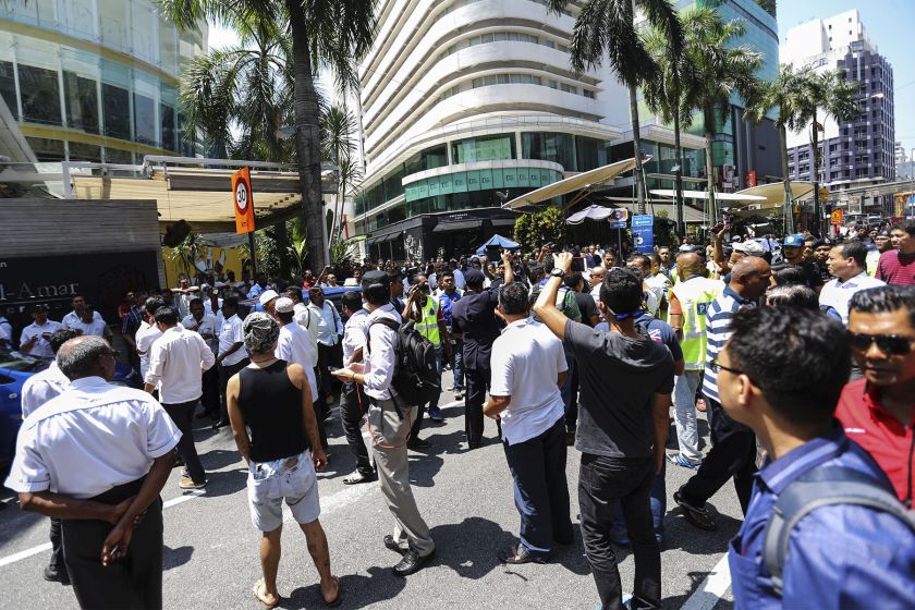 Taxi drivers stage a protest against SPAD and Uber near the Pavilion Kuala Lumpur March 29, 2016. 