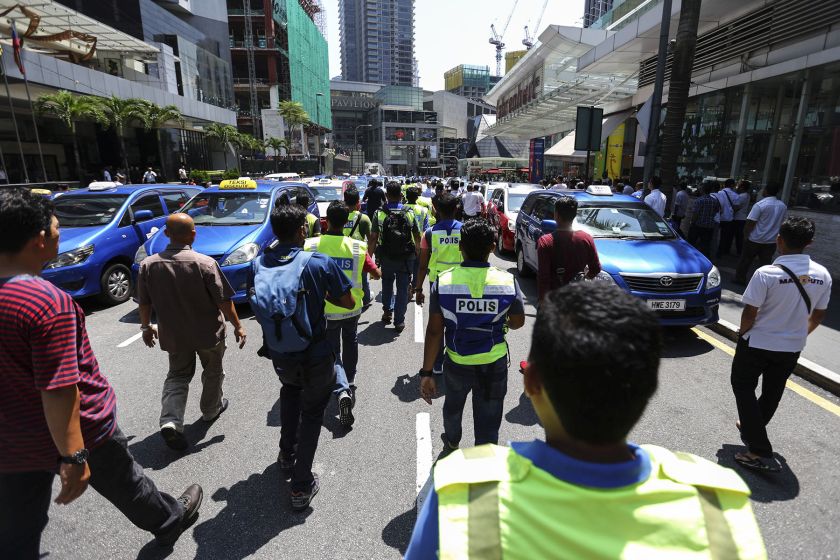 Taxi drivers stage a protest against SPAD and Uber near Pavilion Kuala Lumpur March 29, 2016. u00e2u20acu201d Picture by Yusof Mat Isa