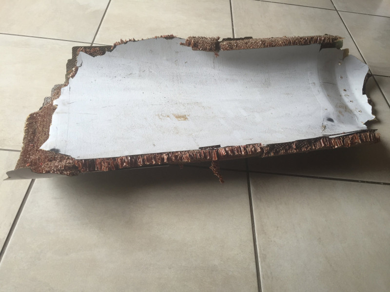A piece of debris found by a South African family off the Mozambique coast in December 2015, which authorities will examine to see if it is from missing Malaysia Airlines flight MH370, is pictured in this handout photo released to Reuters March 11, 2016. 