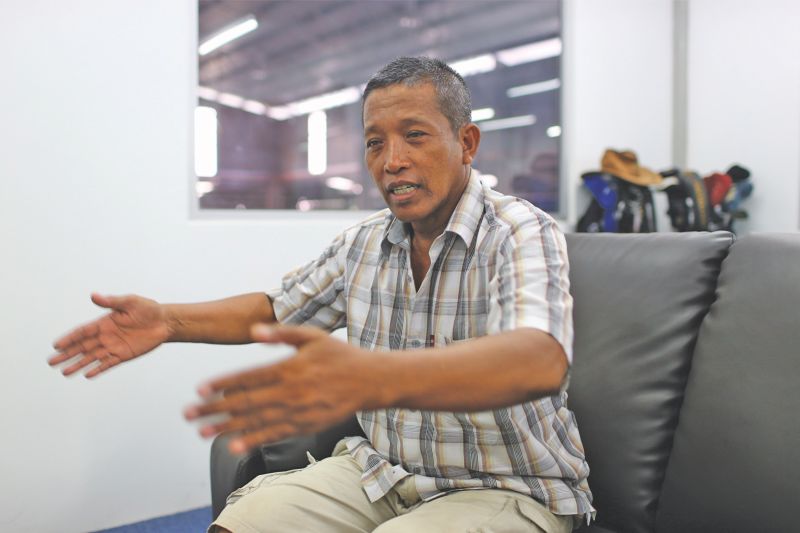 Nadjib says he fainted when he arrived at the scene of the collapsed building. u00e2u20acu201d Picture by Ahmad Zamzahuri