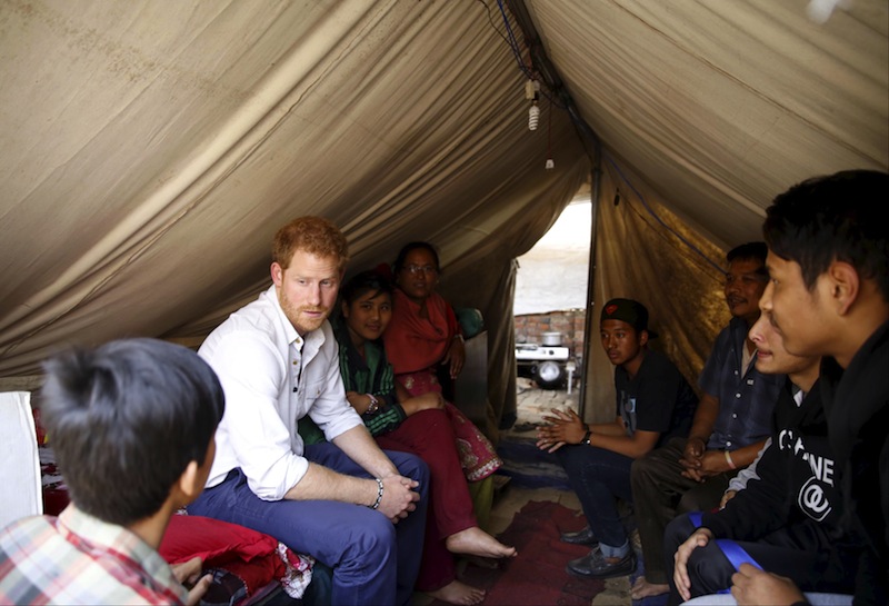 Britainu00e2u20acu2122s Prince Harry sits inside a temporary shelter as he visit the camp for displaced families after last yearu00e2u20acu2122s earthquake in Bhaktapur, Nepal, March 20, 2016. u00e2u20acu201d Reuters pic