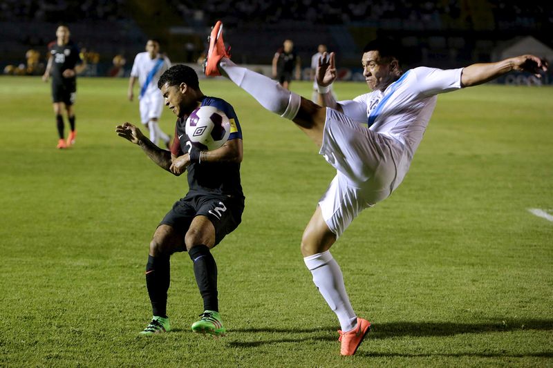Rafael Morales (ru00e2u0081u00acight) of Guatemala and DeAndre Yedlin of US in World Cup qualifying action in Guatemala City March 25, 2016. u00e2u20acu201d Reuters pic