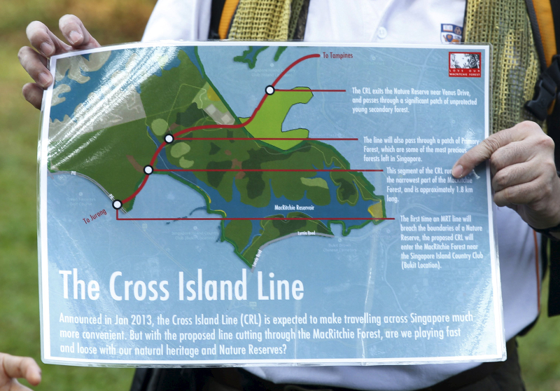 Volunteers speak about how the Cross Island Line subway will affect the central catchment area as they lead a nature tour in MacRitchie Nature Reserve in Singapore March 19, 2016. u00e2u20acu201d Reuters pic