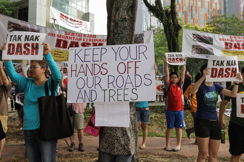 Damansara Perdana residents hold placards and shout slogans during a Say No To Dash rally at Metropolitan Square in Petaling Jaya March 20, 2016. u00e2u20acu201d Picture by Yusof Mat Isa
