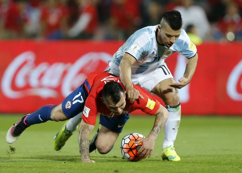Sergio Aguero (right) of Argentina and Gary Medel of Chile in action in their World Cup qualifier in Santiago March 24, 2016. u00e2u20acu201d Reuters pic