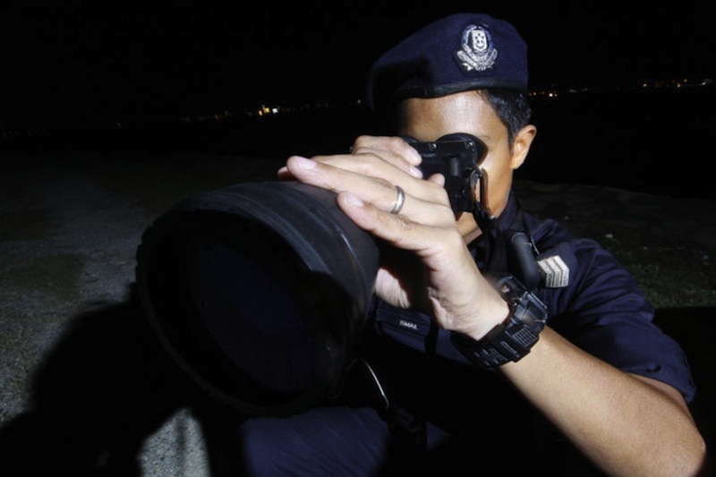 A security personnel from the Police Coast Guard-Coastal Security Patrol Force. u00e2u20acu201d TODAY pic