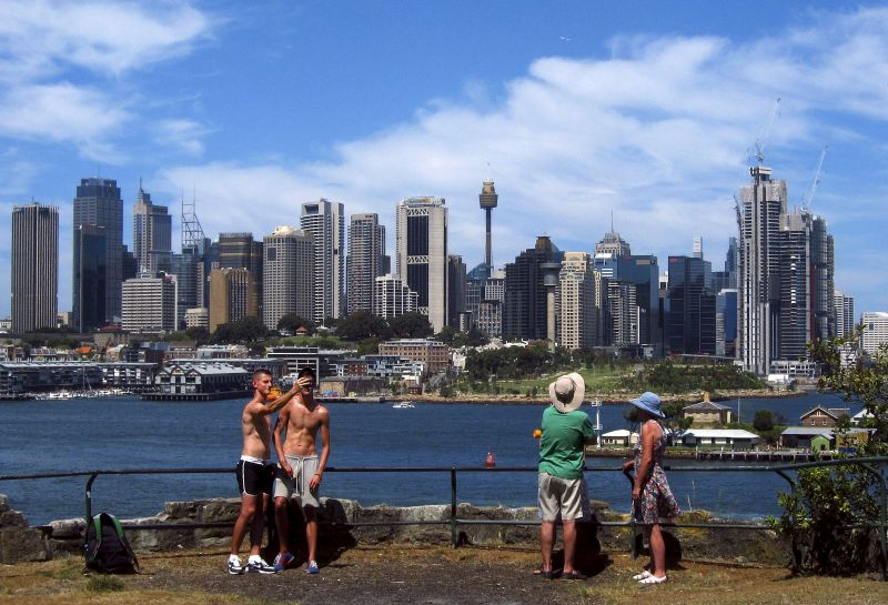 Tourists take photographs as they look from a nature reserve at the central business district of Sydney, Australia March 9, 2016. u00e2u20acu2022 Reuters pic