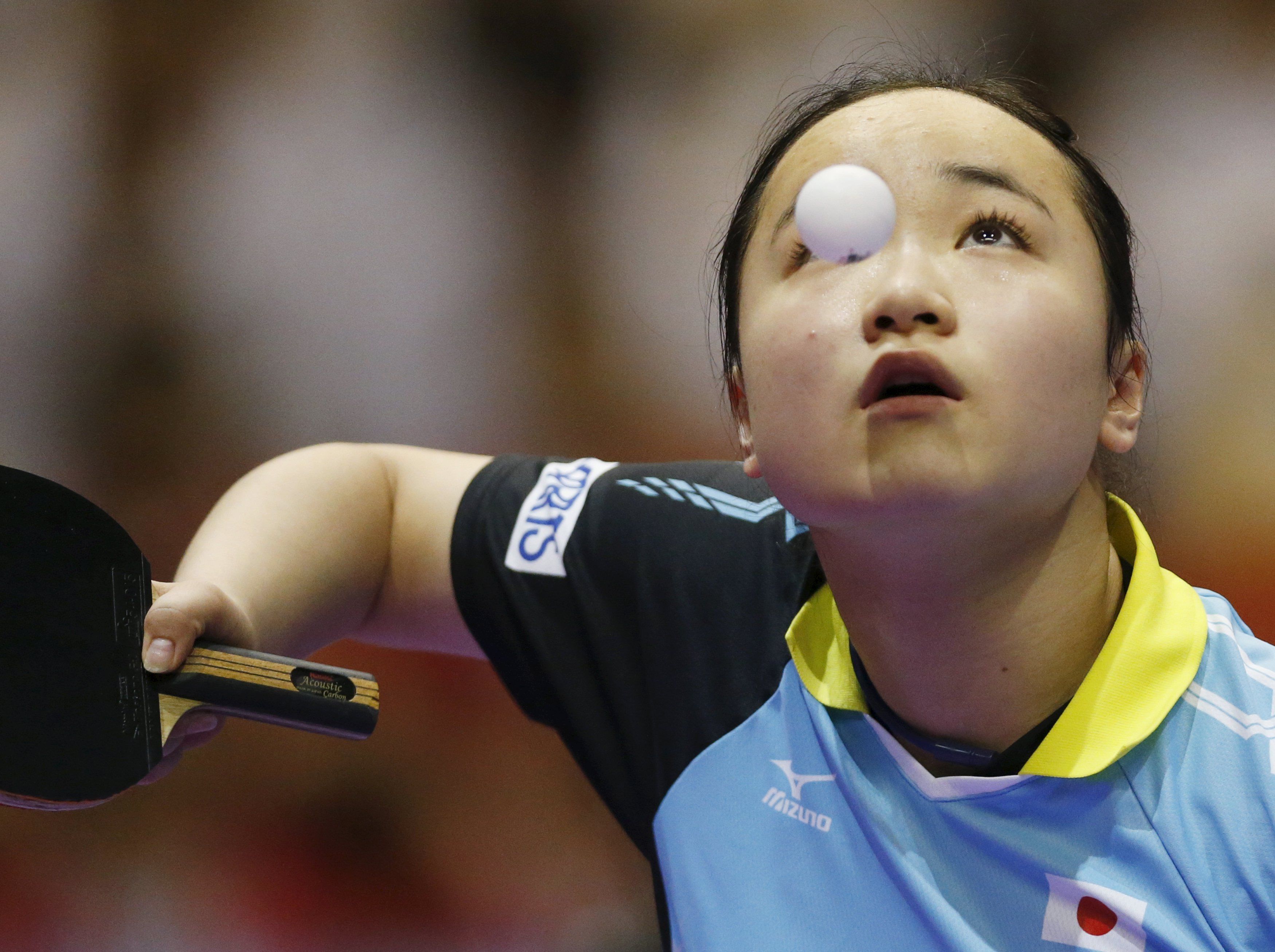 Japan’s 15-year-old Mima Ito takes the fight to world number two Ding Ning to go down 8-11, 11-7, 11-8, 11-1. — Reuters pic