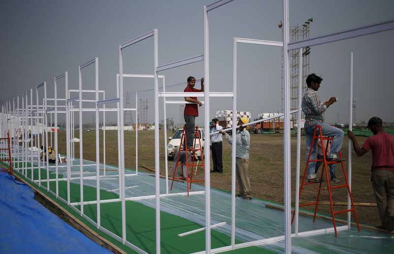 Workers install temporary stalls at the venue of World Culture Festival on the banks of the river Yamuna in New Delhi, India, in this picture taken March 8, 2016. u00e2u20acu201d Reuters pic